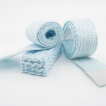 Hellblaues, hitzebeständiges Band, aufgerollt und gefaltet, geeignet für Hochtemperatur-Isolierungen und industrielle Anwendungen. thumbnail